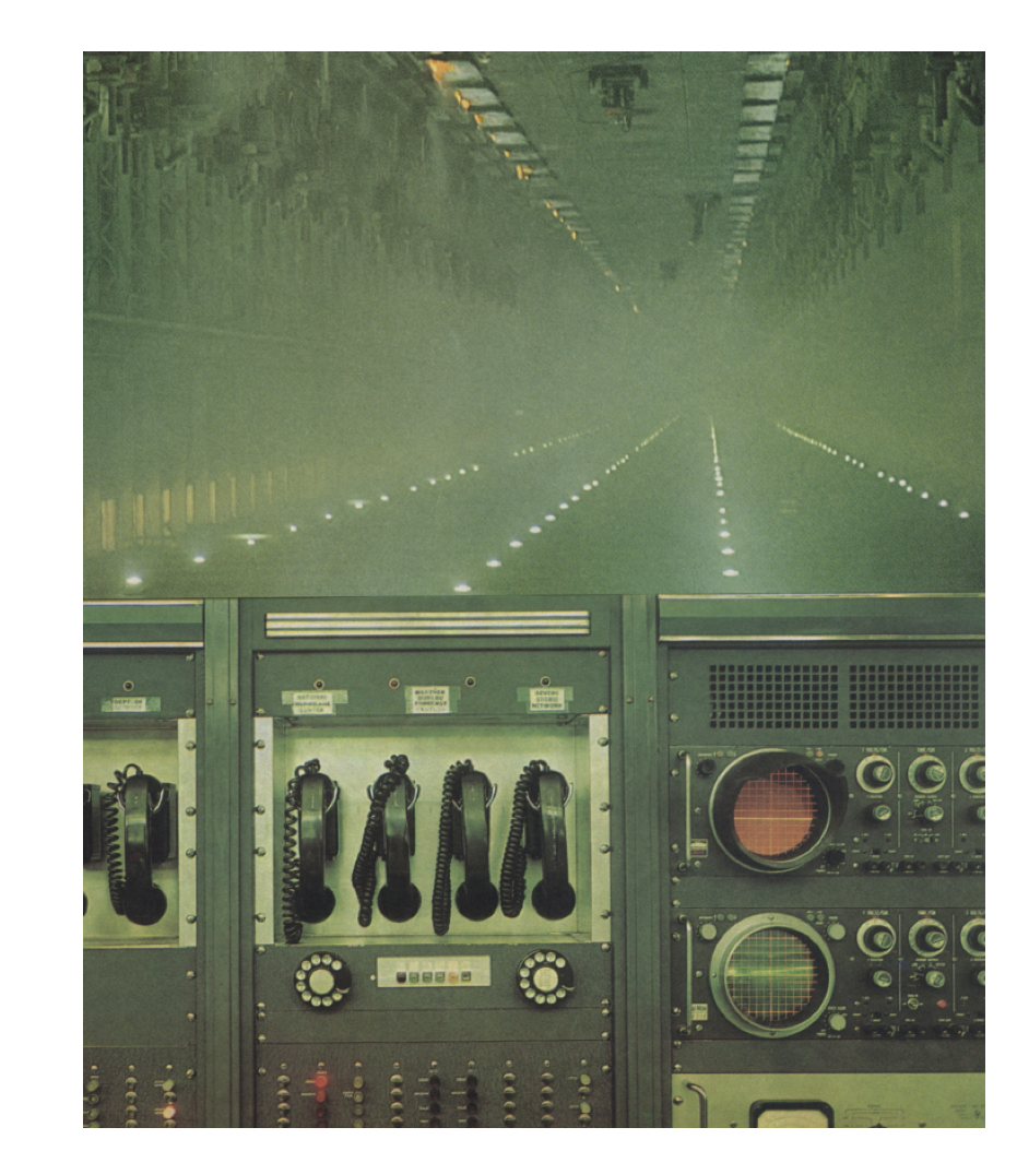 Colour photo collage: A green interior lit by run-way lights, above a bank of obsolete communications equipment and sensors.