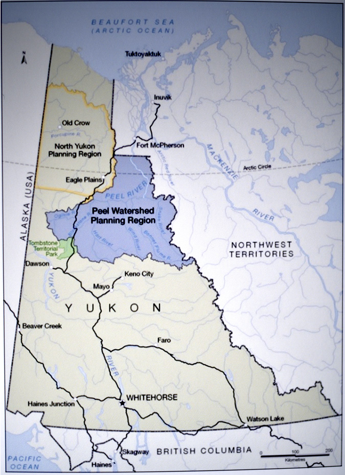 The Peel Watershed boundaries are highlighted on a map of the Yukon Territory with the boundary of Alaska to the west and the Northwest Territories to the east. The Watershed boundary is far in the northwest part of the region. North of Dawson City, and past the Arctic Circle to just south of Fort McPherson.