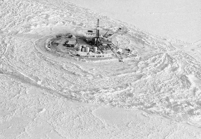 Esso Resources became the Imperial Oil division engaged in new exploration and development particularly in northern Canada in the 1970s-80s. This photo shows a drilling rig completely surrounded by ice on the Beaufort Sea. These operations were mostly carried out in the winter. 