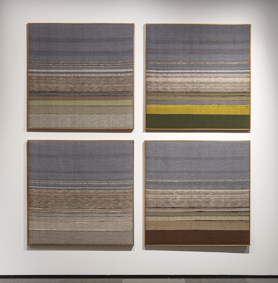 Photo: four squares in a group made up of blue upper thirds and horizontal stripes: one is light green and tan, one white, yellow, and green, one shades of white and grey, and the last whites and browns.