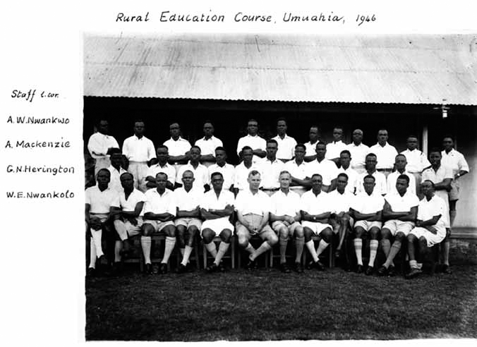 A black and white photograph shows a group picture of people from a rural education course for the teacher's school farm program.