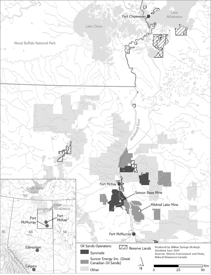 The image is a map highlighting the oil sands operations and reserve lands in the region surrounding Fort McMurray, Alberta, Canada. The map is in grayscale with various shaded patterns indicating different land uses. The background consists of a detailed geographical representation, including rivers, national parks, and large lakes, such as Lake Claire and Lake Athabasca