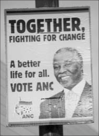 A poster contains a photo of President Thabo Mbeki and the logo of ANC. Text reads as follows: Together, Fighting for Change. A better life for all. Vote ANC. 