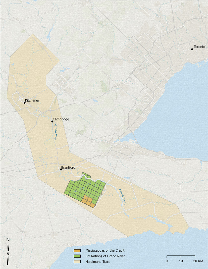 Colour map. Map of the Haldimand tract along the Grand River beginning at the river’s outlet on Lake Erie and extending west, north, and then east in a wide ribbon of land on either side of the river’s banks for a long distance. A small grid of green and orange rectangles south of Brantford and within this large tract of land marks the present Six Nations of the Grand River and Missisaugas of the Credit reserves respectively.