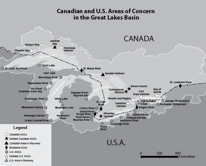 This figure is a map showing the Canadian and US AOCs in the Great Lakes basin, with different symbols for different locations according to whether they are active, delisted, or recovery.