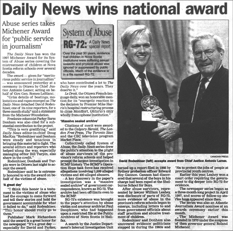 Black and white scan of newspaper front page: The main headline at the top is “Daily News wins national award.” A picture of two men in suits shaking hands, and the man on the left receiving a trophy is shown.