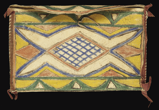 Yellow, green, blue and fading red pattern on a rectangle with loose edges of extra material.