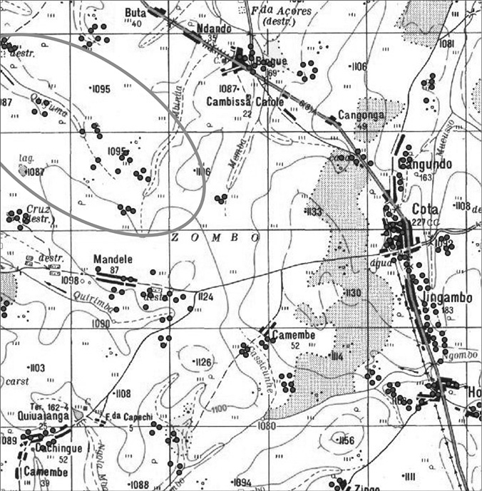 Black and white map extract. Many dots and black rectangles are present across the map. They are particularly prevalent in the right half of the map, along where the road runs, and in the bottom and top left corners. Topographic lines cross the map, and there is a grid overlay.