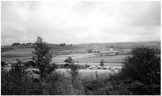 A black and white photograph of the vast fields of the rural Umbunbula part of Sobonakhona Makhanya and Embo TA.