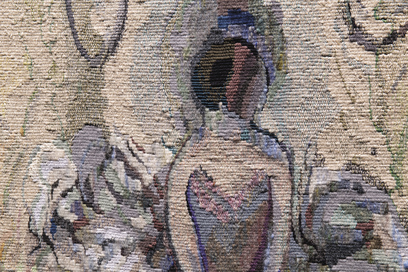 Detail of the textile version of the previous image with a focus on the ballerina's head and tutu. 