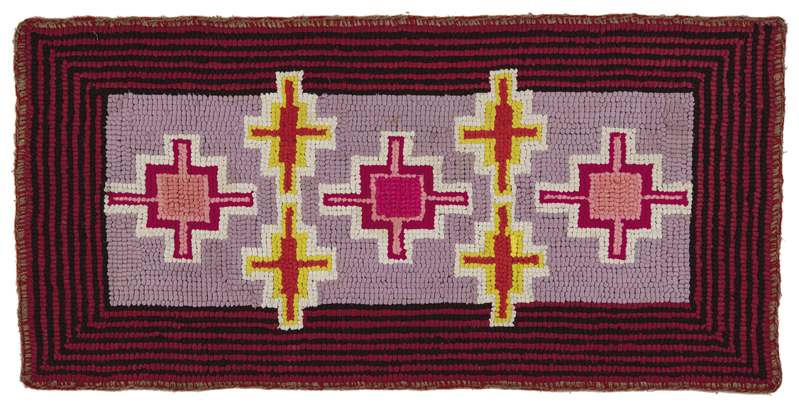 Photo: horizontal run with red and darker red lines running in a border around a lilac center filled with pink and dark pink, and yellow and red crosses. The crossed all have a square of color at the intersection. 