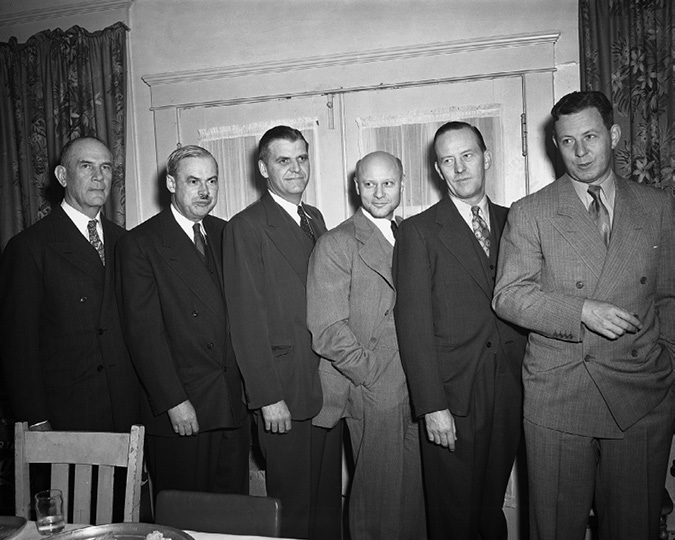 This group photo of Imperial Oil executives was taken in 1950 and comprises a number of figures who held prominent positions in Jersey Standard/Exxon. Included from the far left: O.B. Hopkins, who began his career with Imperial as a geologist and later headed Interprovincial Pipeline; J. Kenneth Jamieson, third from the left, who became chief executive at Exxon in the 1970s; Michael Haider, third from the right, who was on the board of both Imperial Oil and Exxon as well as International Petroleum; and on the far right, Jack R. White, president of Imperial Oil in the 1950s.