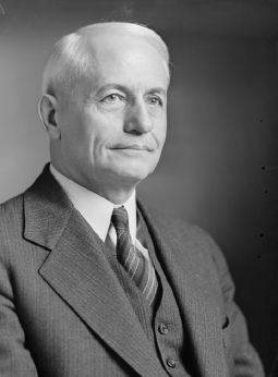 A portrait image of J. B. Harkin.
