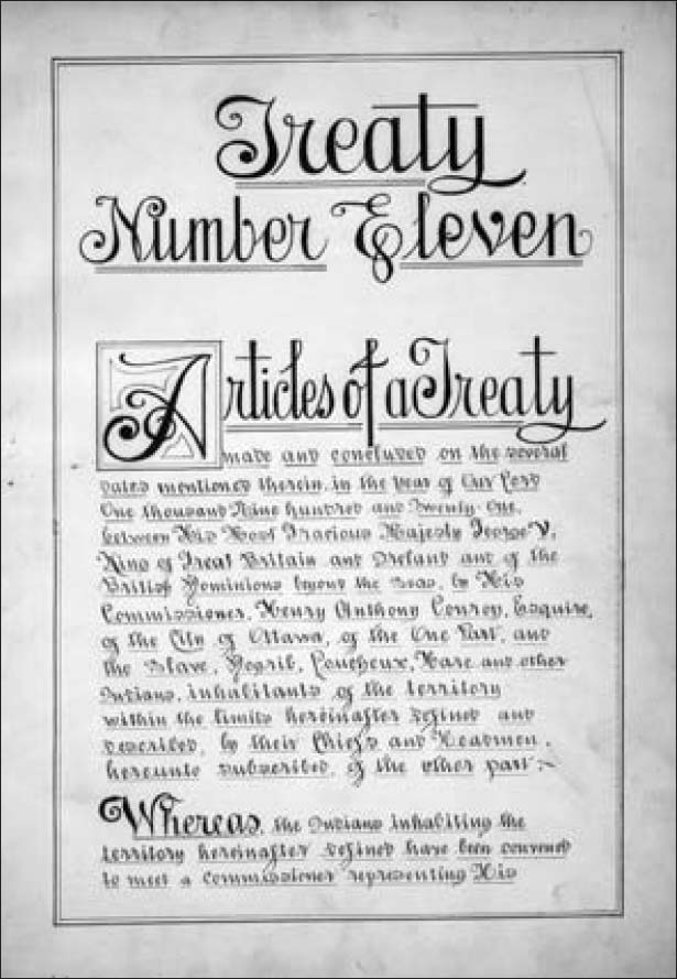 A photo of an old parchment titled Treaty Number Eleven, written in ornate font. A passage below mentions the Articles of a Treaty.