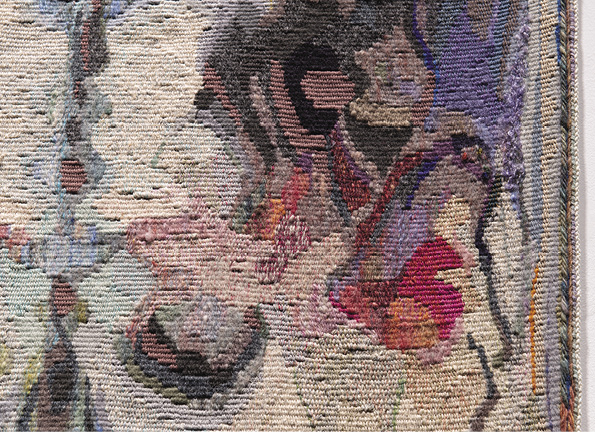 Detail of the textile version of the previous image with a focus on the wolf's ear and eye.